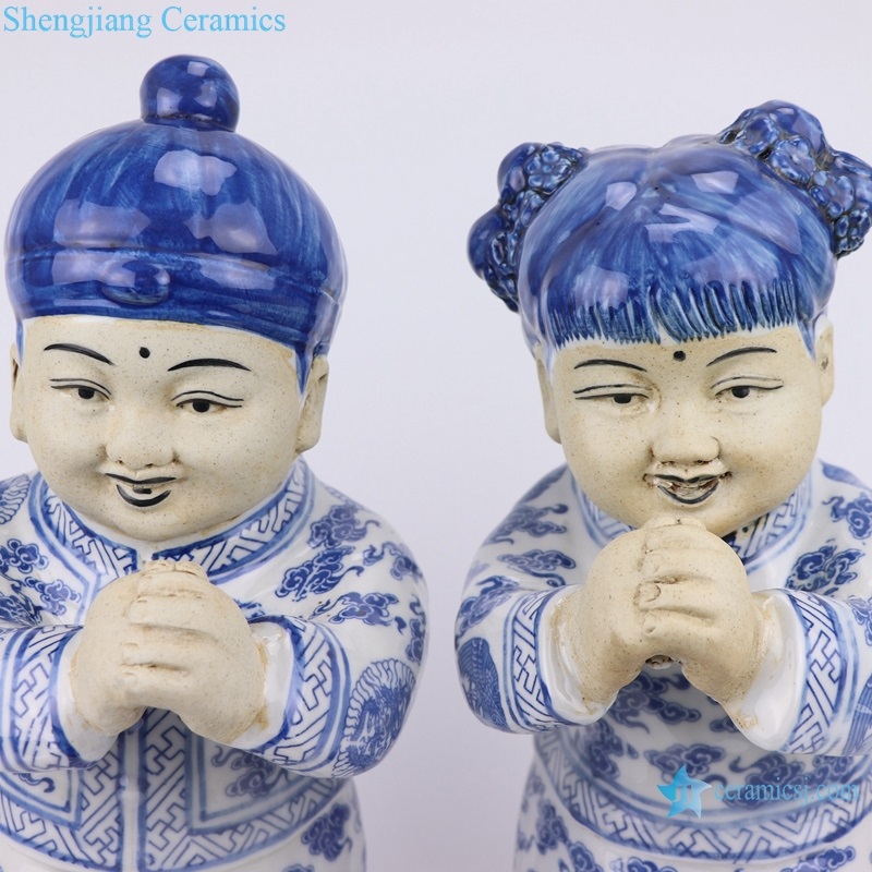  boy and girl ceramic statue detail