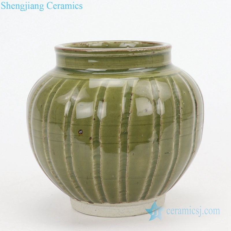 Green color glaze ceramic vase front view