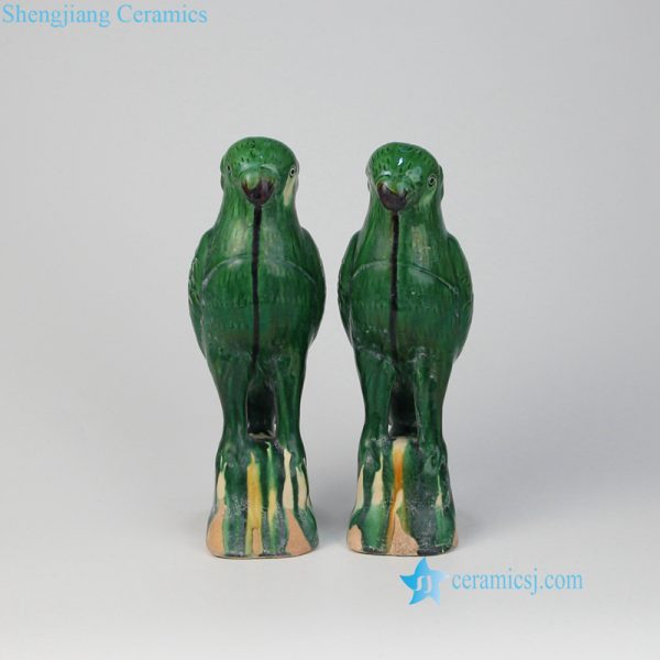 green ceramic parrot figurines