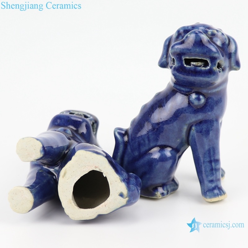 Deep blue poodle siting pattern statue bottom  view 